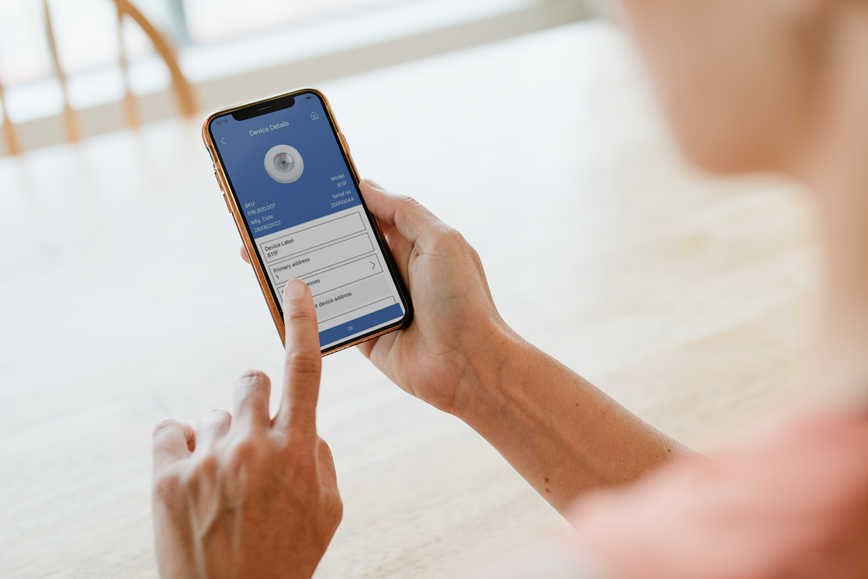 Close-up of a person scrolling through an application on a mobile