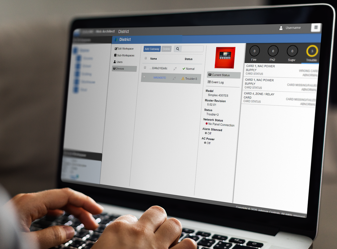 Close-up of a person working on a laptop